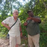 Guide showing clients wildlife in Cape Vidal